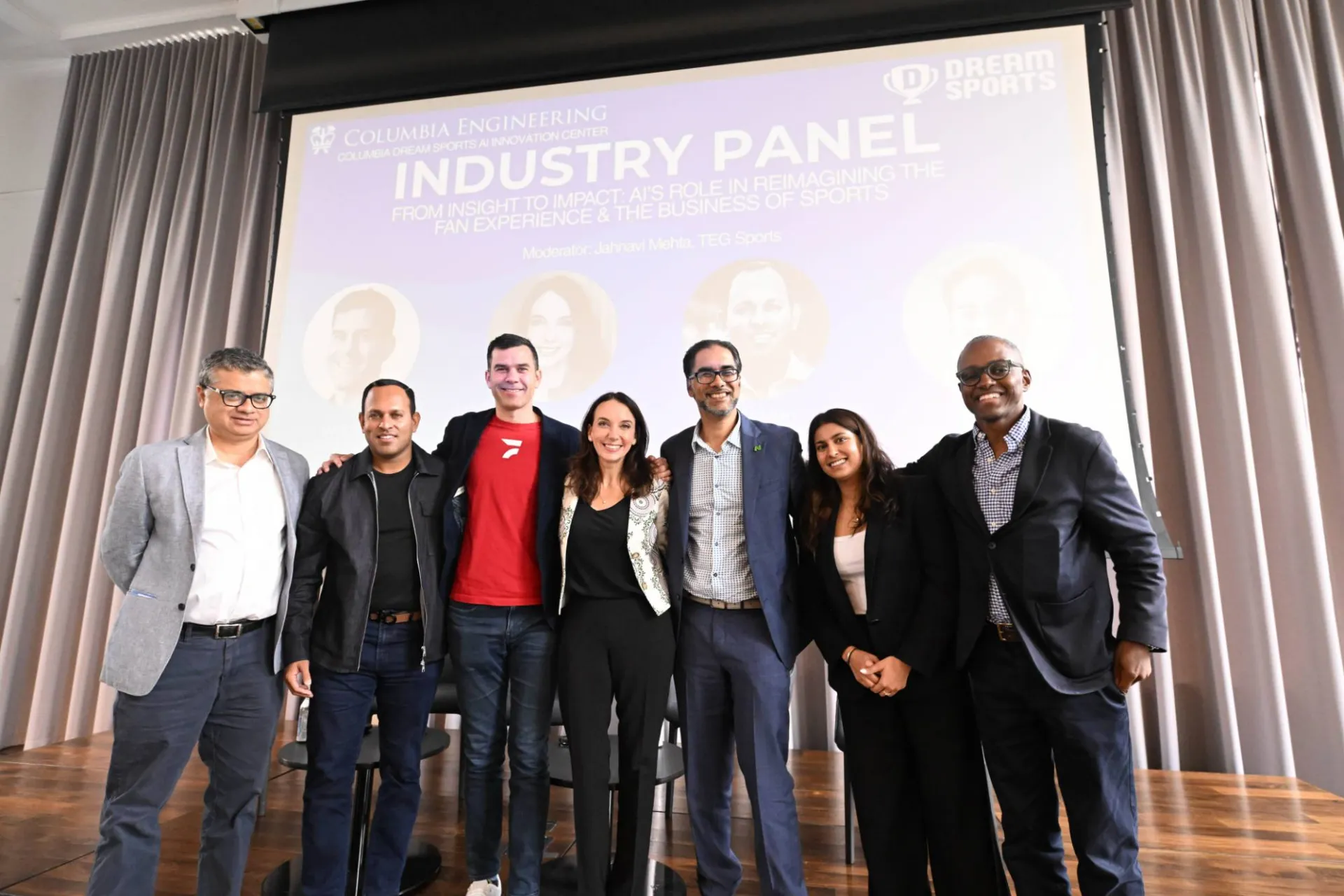 image of 7 panelists huddled for a group picture, behind them a graphic showing their credentials and "industry panel" in large text